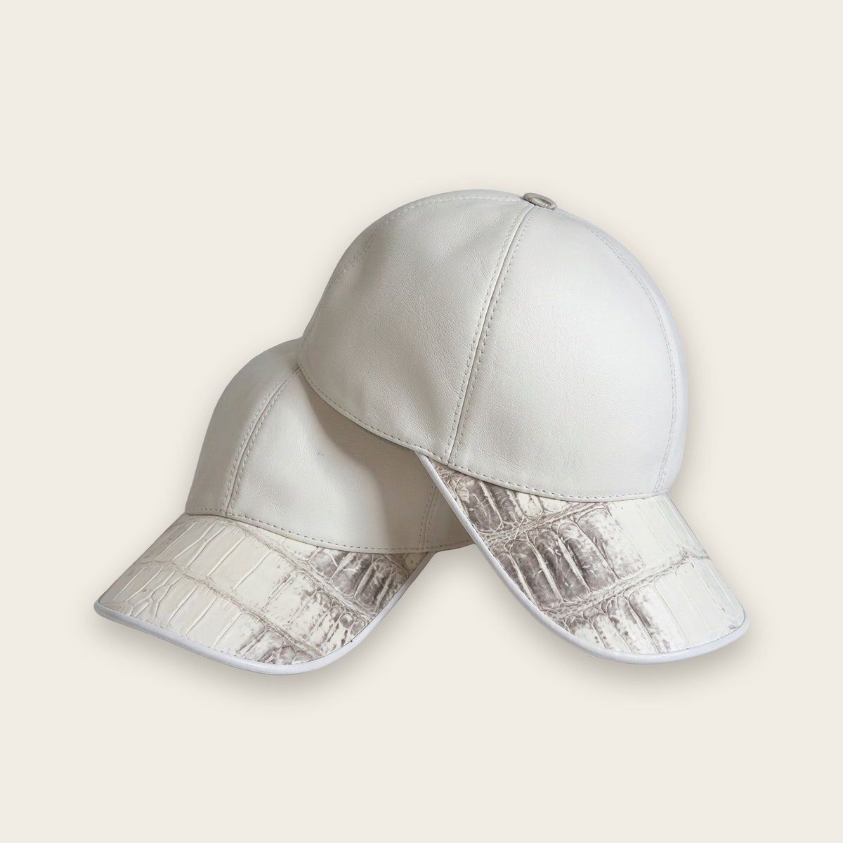 Crocodile trim leather caps